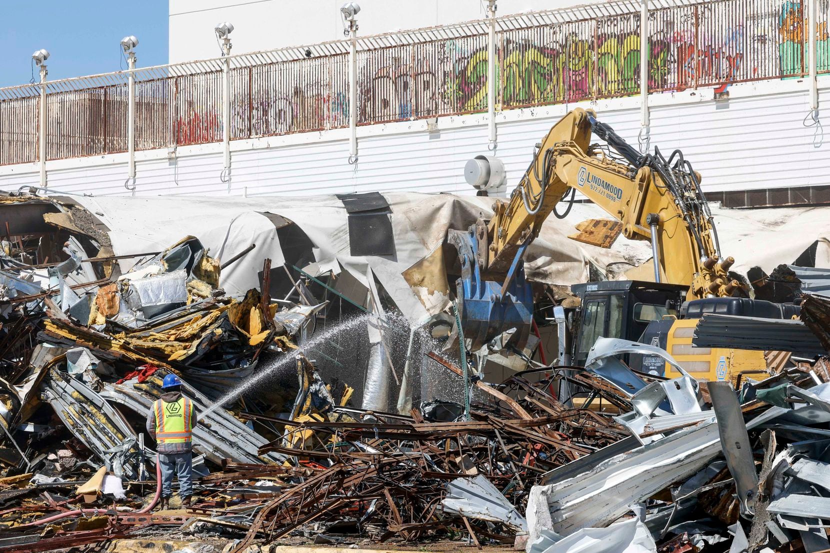 Crews work on the demolition scene of former Valley View Mall on Friday, March 17, 2023 in...