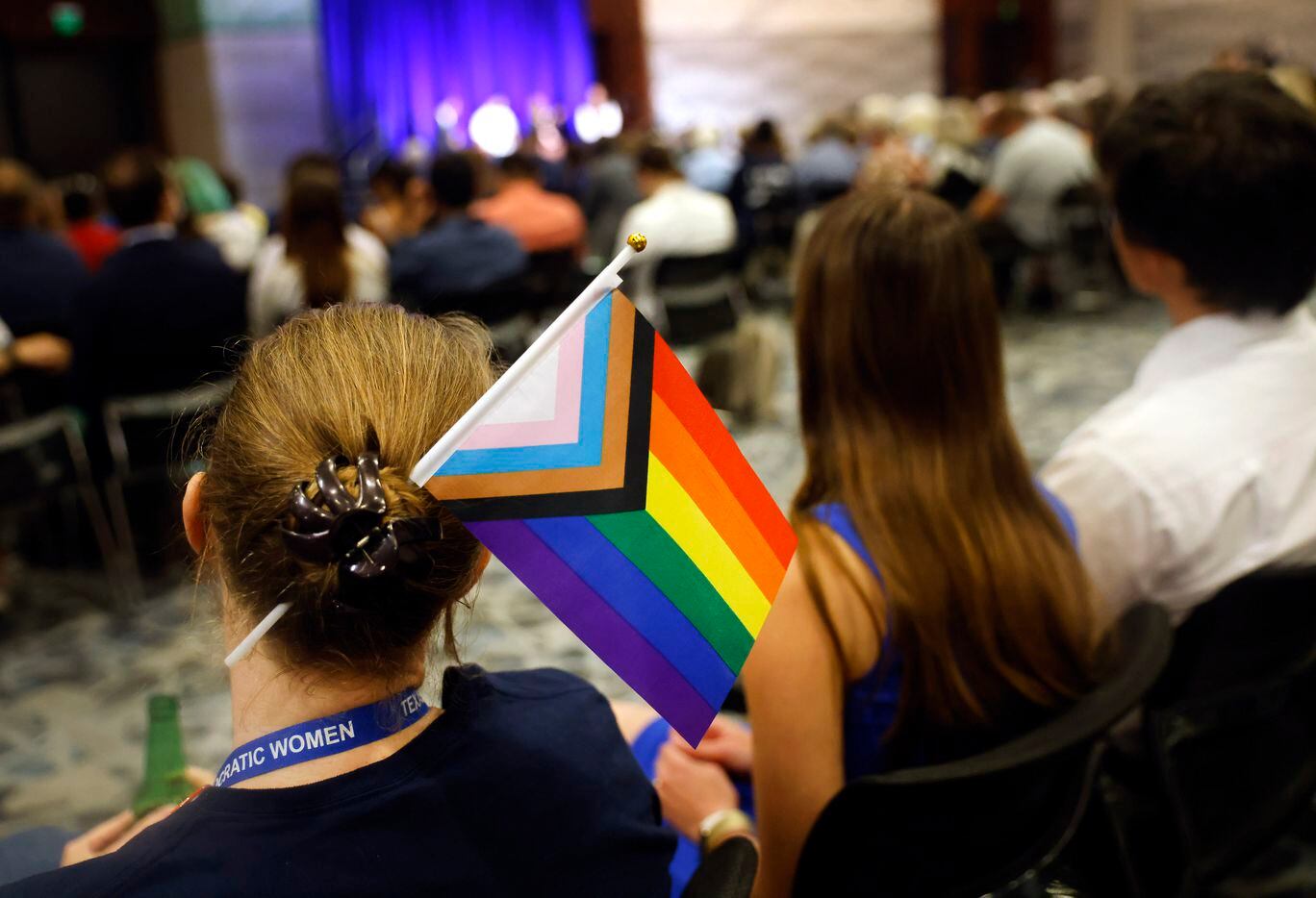A woman supporting the LGBTQ community wore a flag in her hair during the kick-off reception...