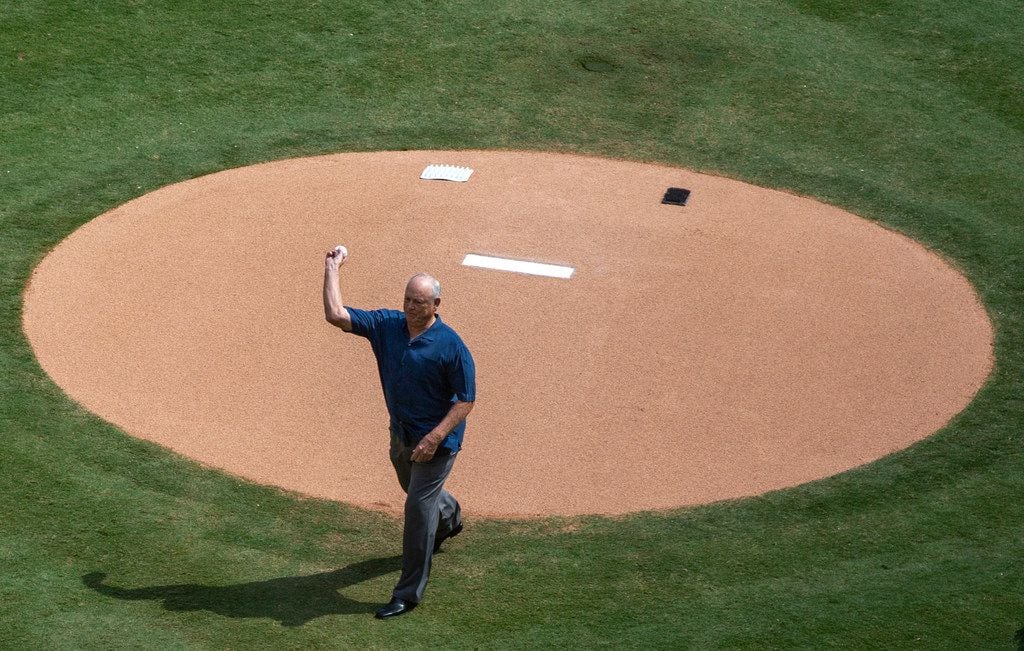 Texas Rangers legend Nolan Ryan pitches the final first pitch for the Rangers' final game...