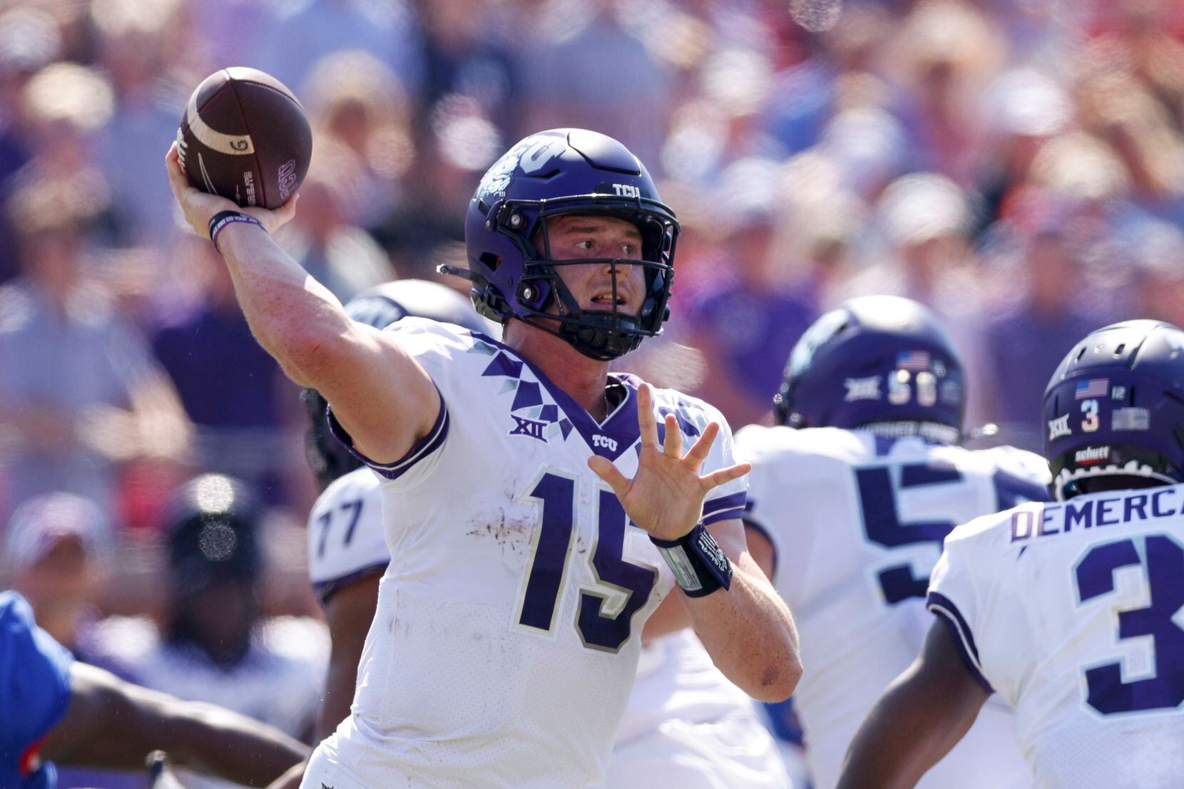 TCU quarterback Max Duggan (15) throws a pass during the first half of a game against SMU at...