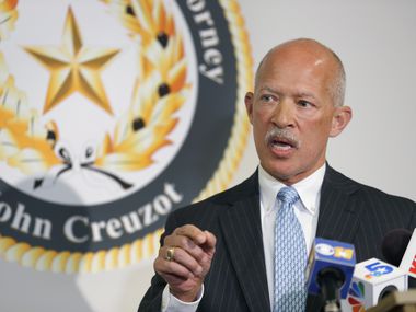 File image of Dallas County District Attorney John Creuzot speaking during a press conference at the Frank Crowley Courts Building in Dallas, Wednesday, January 8, 2020.
