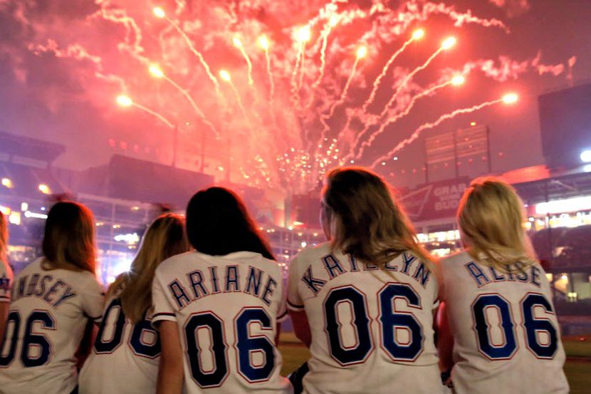Texas Rangers Six Shooters watch the fireworks show after the Rangers' 6-3 loss to the Los...