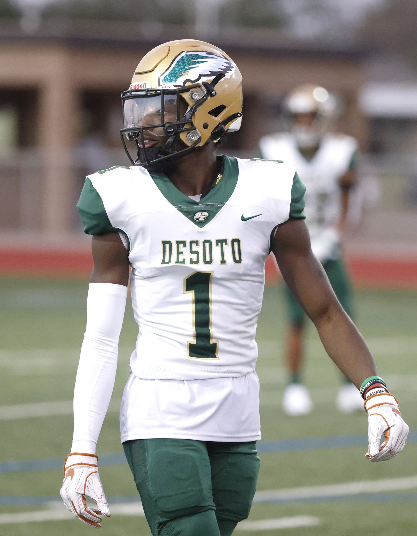 DeSoto wide receiver Johntay Cook II (1) looks on as DeSoto plays Arlington Bowie during the...