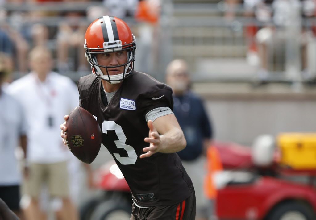 Cleveland Browns quarterback Josh McCown drops back to pass during their orange and brown...