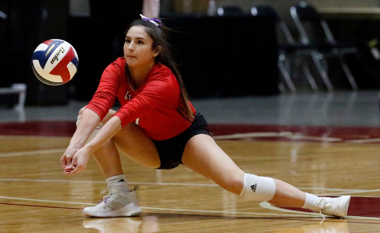Colleyville Heritage High School liber Ava Ash (7) receives a serve during game three as...
