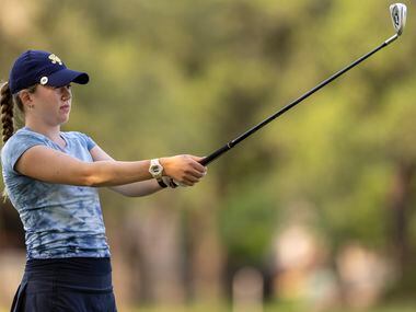 Highland Park’s Sophie Biediger studies her shot from the 3rd fairway during the 5A girls...