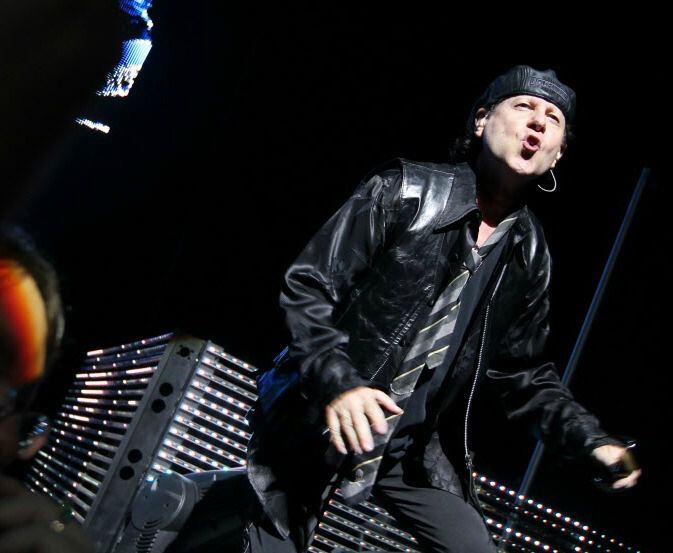 Lead singer Klaus Meine engages fans during the Scorpions' concert at Verizon Theatre in...