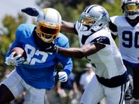 Dallas Cowboys cornerback Jourdan Lewis (2) tackles Los Angeles Chargers wide receiver...