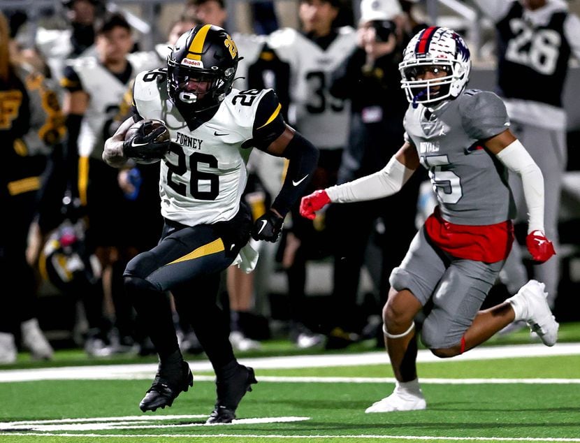 Forney running back Javian Osborne (26) finds a huge hole to run and goes the distance for a...