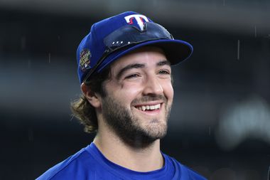 Texas Rangers' Josh Smith smiles after a baseball game against the Detroit Tigers,...