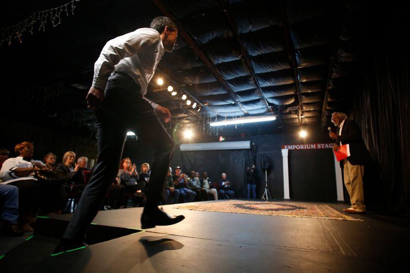 U.S. Congressman Beto O'Rourke walks onto the stage at the Emporium for the Arts in...