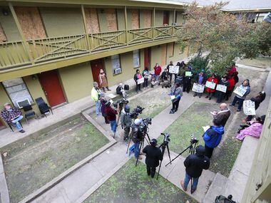 Bryan Song Apartments residents gathered for a press conference on Tuesday.