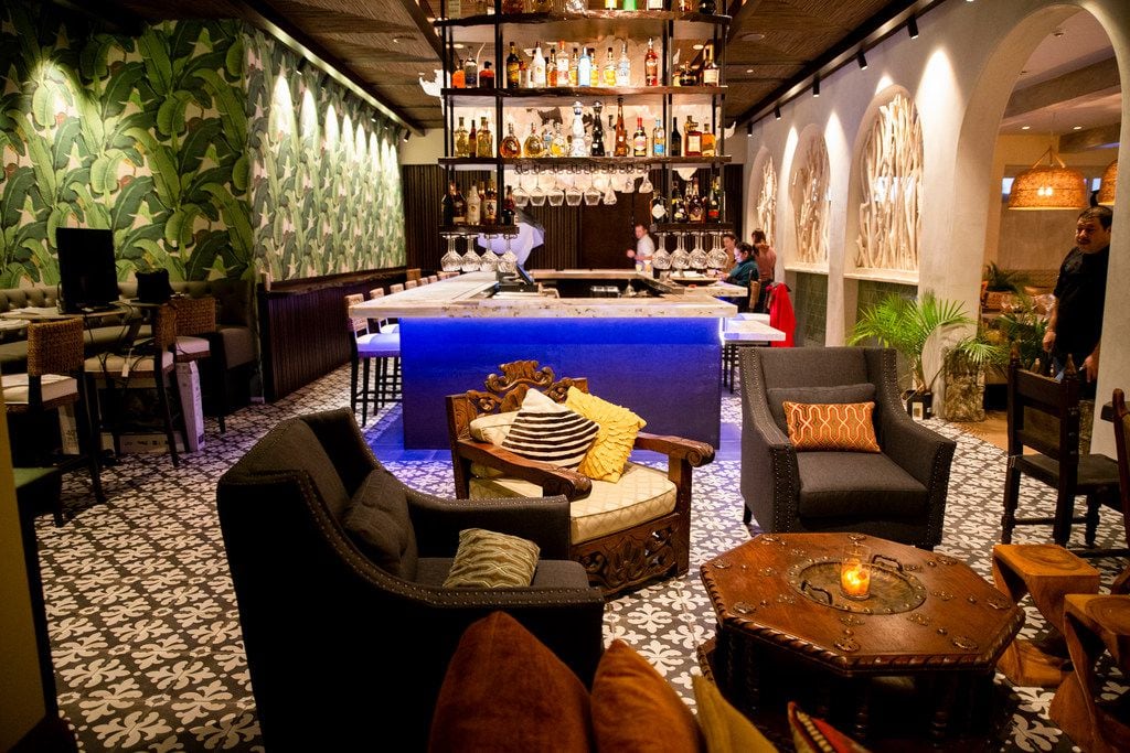 Tulum is a new restaurant in Highland Park that offers the jungle look on one side, beach on...