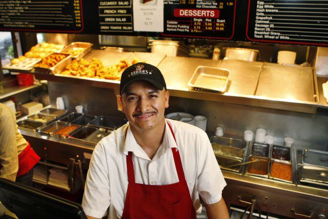 Long time Bubba's Cooks Country employee Antonio Montes, photographed 4-18-13, at the Snider...