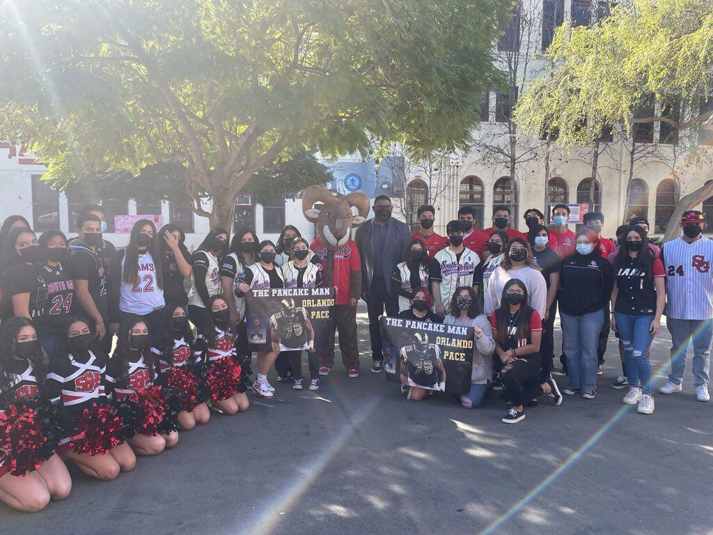 A group photo of LAUSD students and cheerleaders with Kool Kitchens representatives.