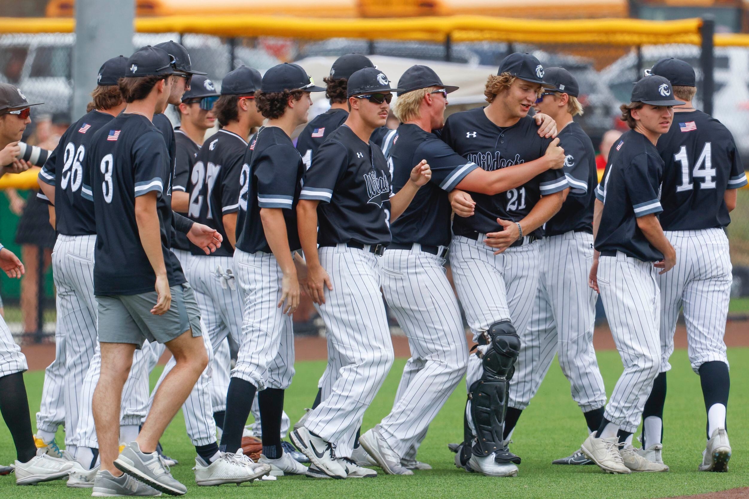Denton Guyer players cheer after winning a baseball game against Byron Nelson High School on...