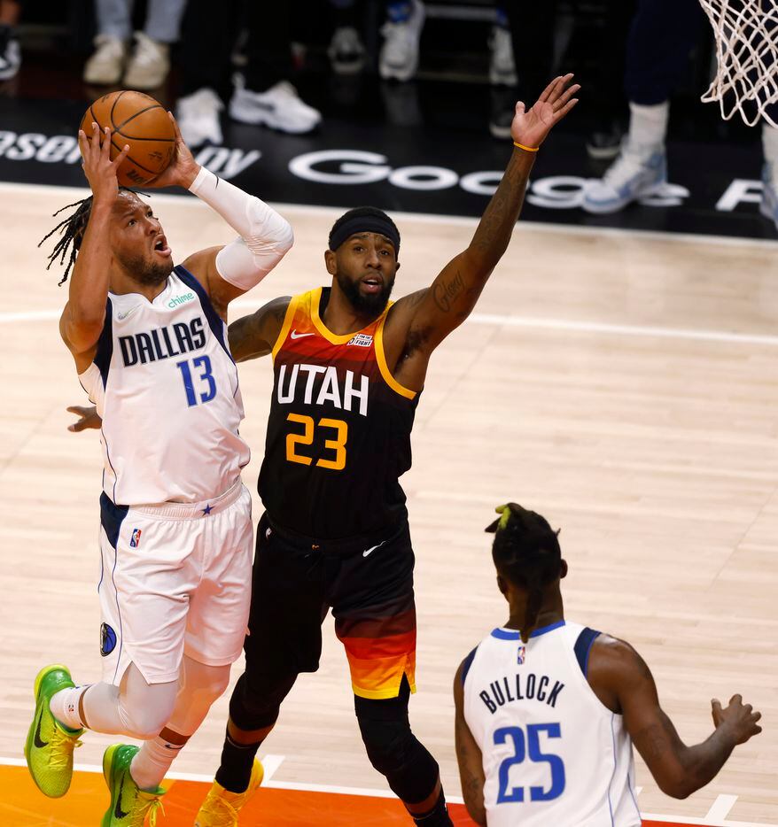 Dallas Mavericks guard Jalen Brunson (13) drives to the basket as Utah Jazz forward Royce...