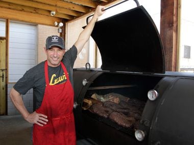 Co-owner Todd David opens the lid on his massive 1000-gallon smoker, Brutus, at Cattleack Barbeque restaurant, Thursday, May 25, 2017 in Farmers Branch, Texas. (David Woo/The Dallas Morning News)