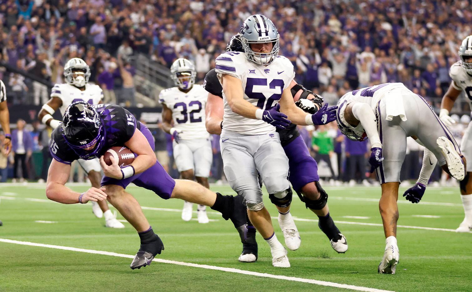 TCU Horned Frogs quarterback Max Duggan (15) dives for a touchdown late in the fourth...