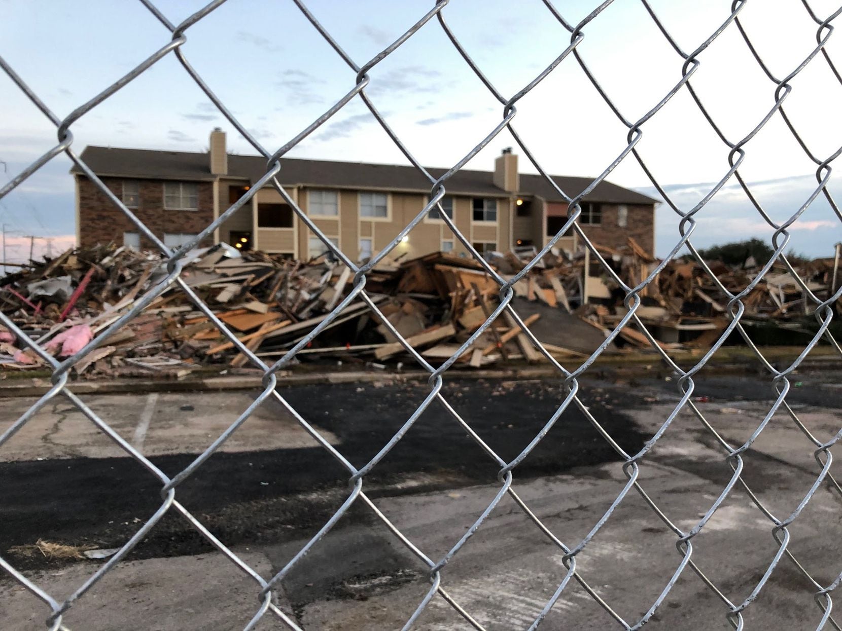 The burned Meadows at Ferguson Building F was demolished Wednesday afternoon.