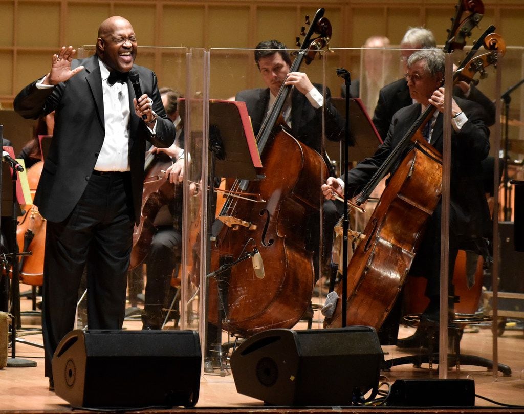 Marvin Winans sings with the Dallas Symphony Orchestra during a performance of Gospel Goes...