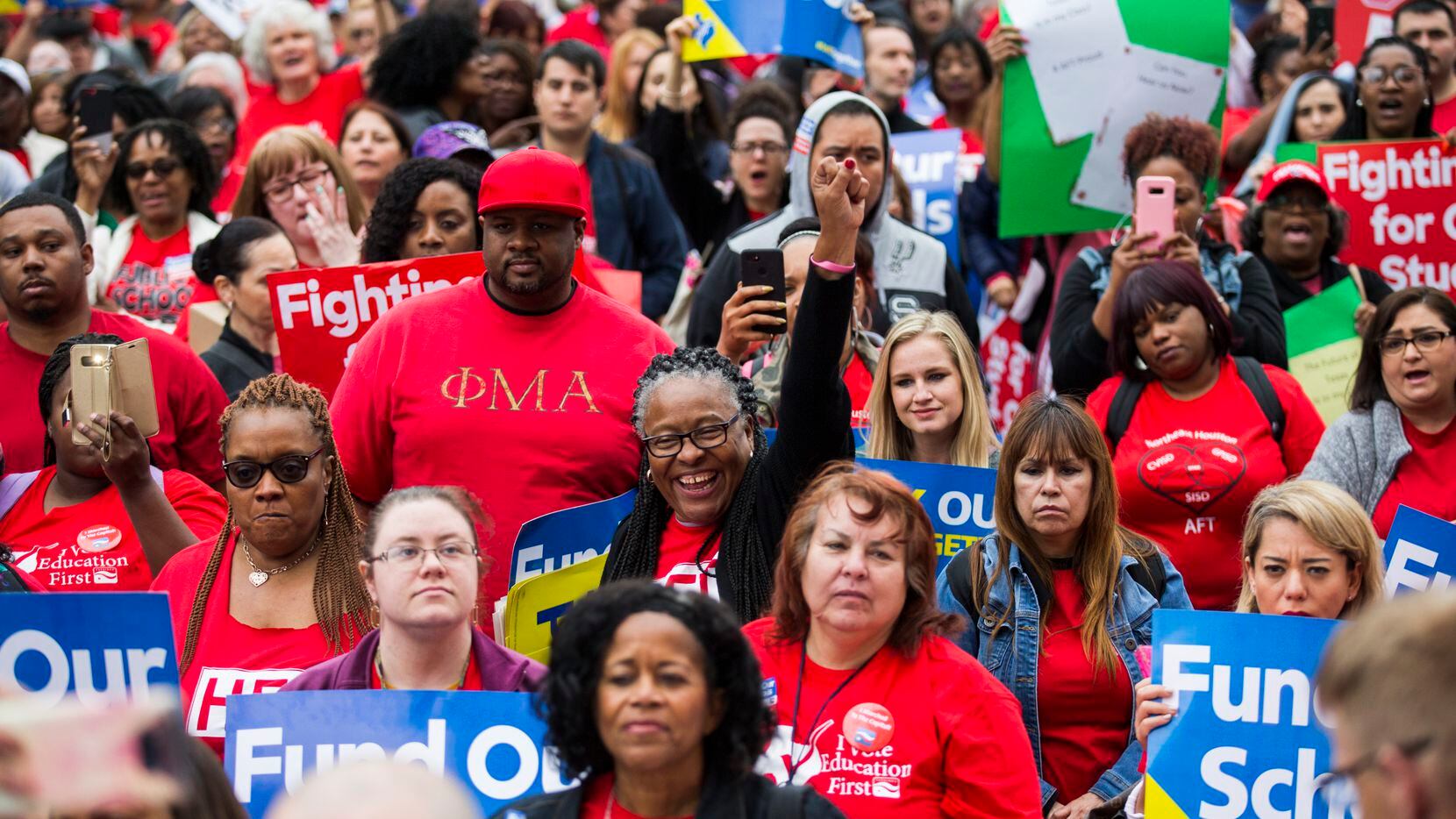 Educators and supporters listen to speakers during the Texas Public Education Rally on...