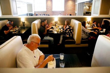 Ellen's Restaurant in the West End now has a new "waiting room" just outside its doors, says...