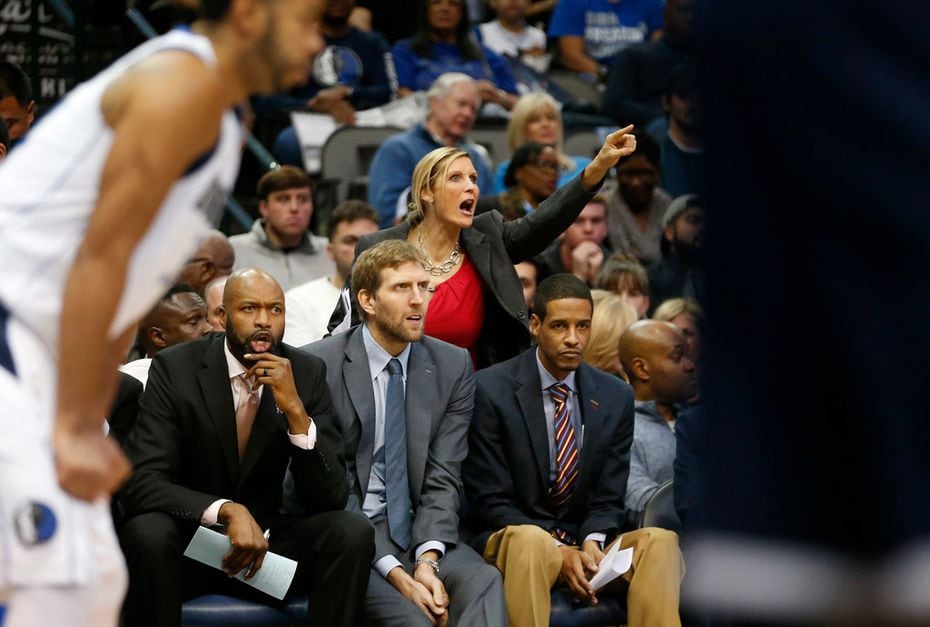 Mavericks assistant coach Jenny Boucek communicates with a player during a game against the...