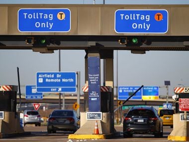 TollTag users use the cashless booths at the north end of Dallas/Fort Worth International Airport.