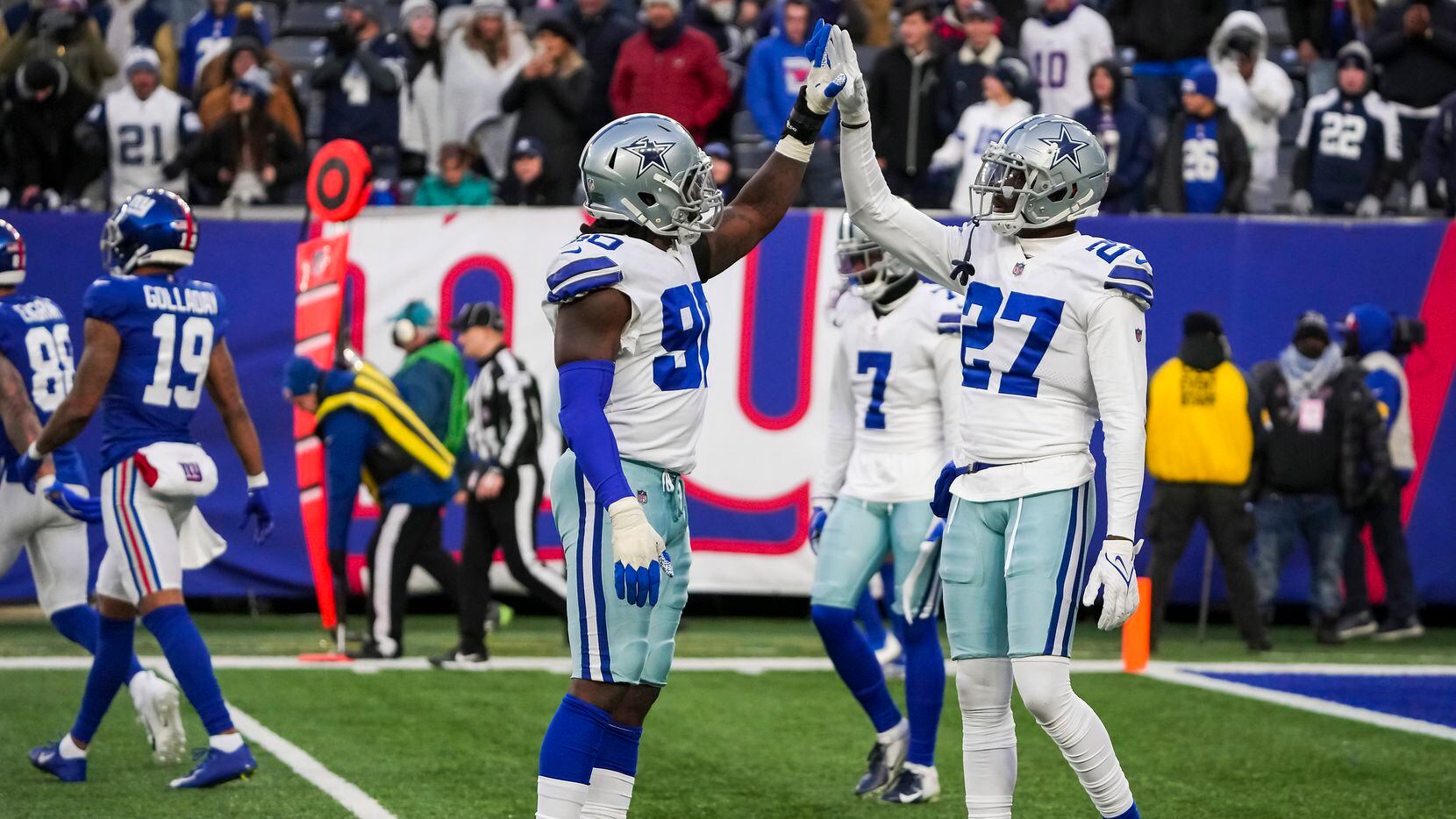 Dallas Cowboys safety Jayron Kearse (27) celebrates with defensive end Demarcus Lawrence...