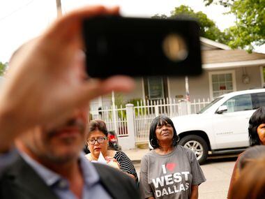 West Dallas residents and supporters came to hear HMK landlord Khraish Khraish announce at a...