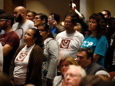 Advocacy groups wait in line to speak during a meeting at the Dallas County Commissioners...