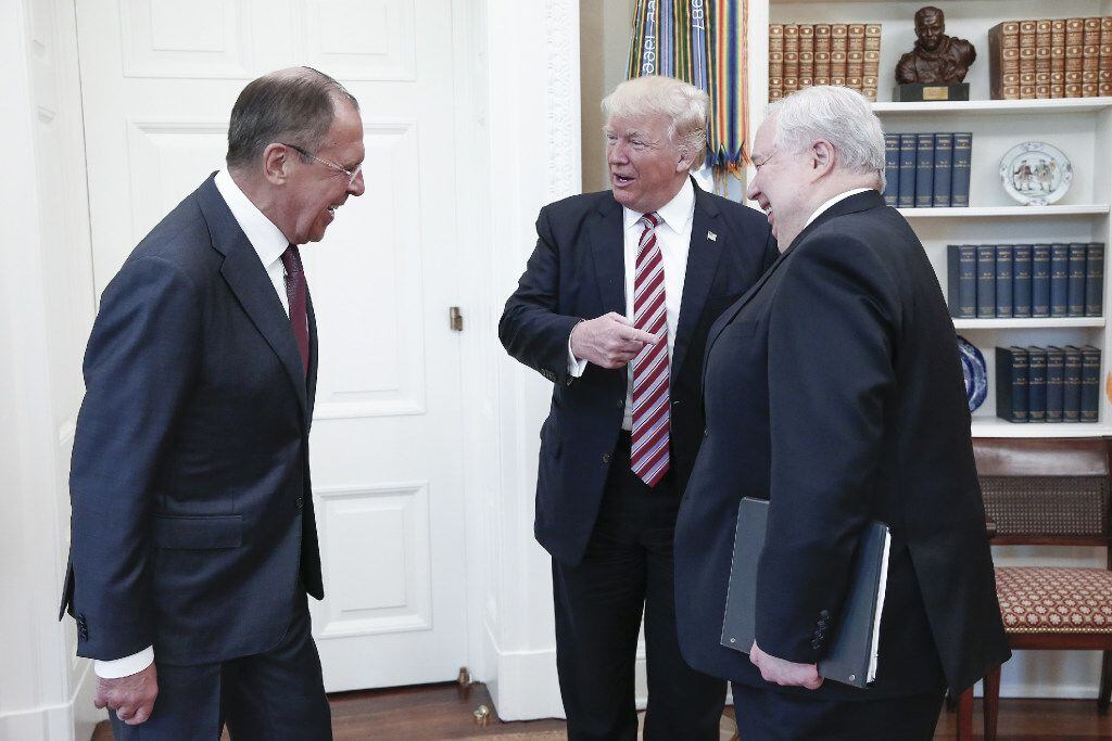 From left, Russia's Foreign Minister Sergei Lavrov, U.S. President Donald Trump, and Russian...