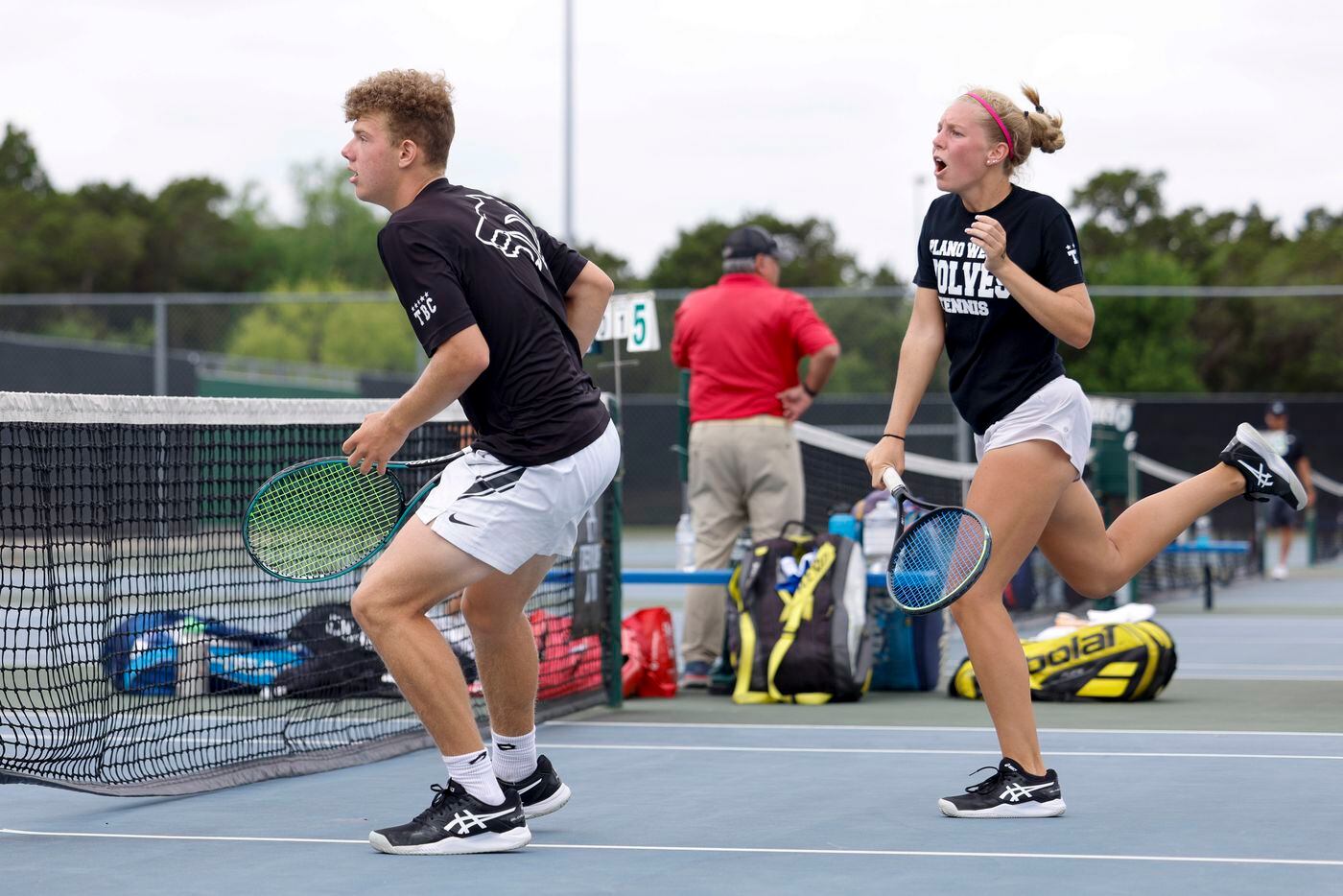 Plano West’s Dmitri Goubin (left) and Summer Shannon watch the ball during the 6A mixed...