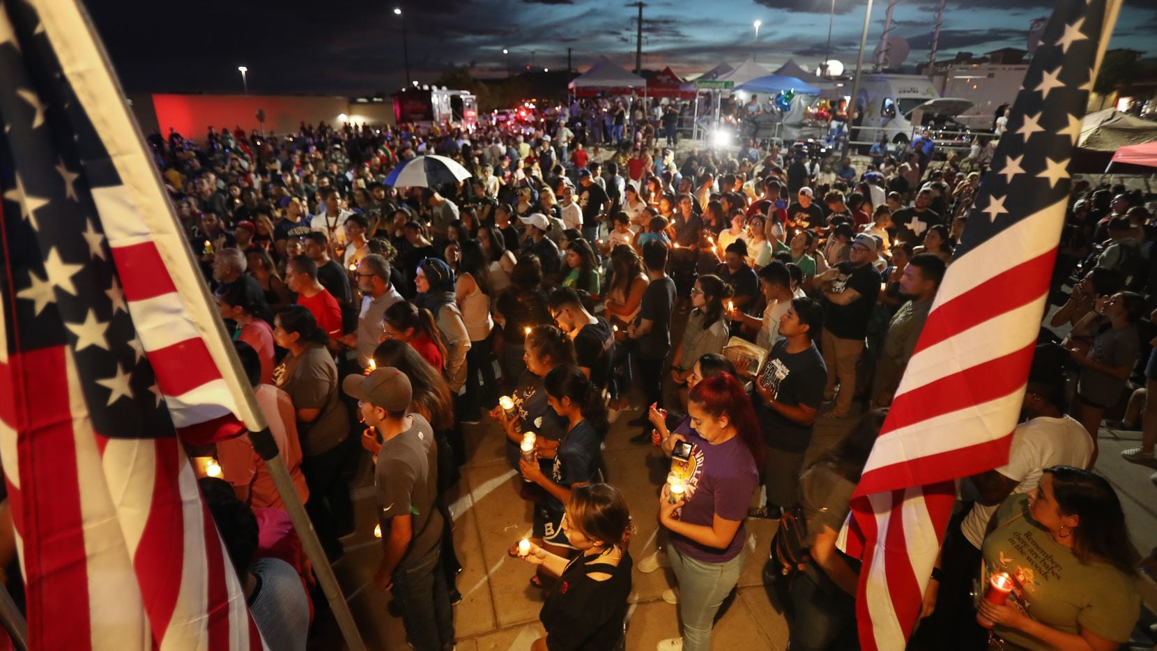 EL PASO, TEXAS - AUGUST 07: People attend a candlelight vigil at a makeshift memorial honoring victims of a mass shooting which left at least 22 people dead, on August 7, 2019 in El Paso, Texas. President Donald Trump visited the city earlier today. A 21-year-old white male suspect remains in custody in El Paso which sits along the U.S.-Mexico border.   (Photo by Mario Tama/Getty Images) ***BESTPIX***