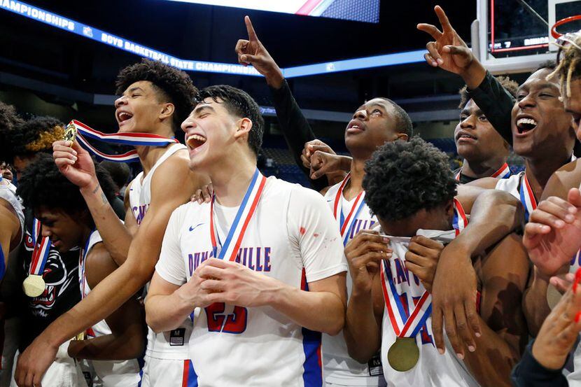 Duncanville celebrates. UIL boys basketball 6A state final between Duncanville and Klein...