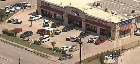 A aerial view of the Hair World Salon, where a shooting left three women injured on Wednesday.
