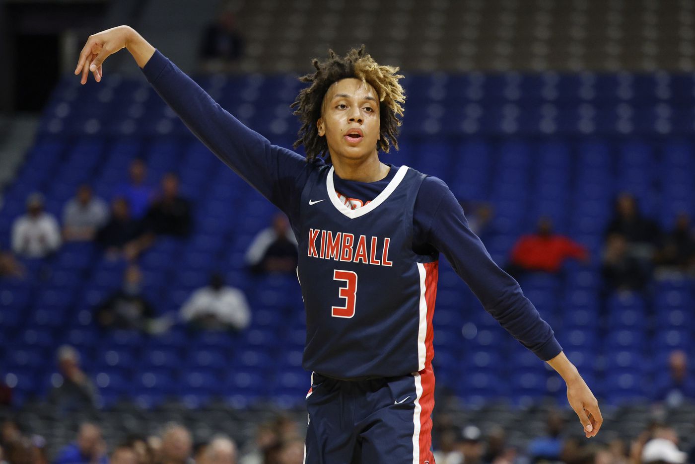 Kimball guard Chauncey Gibson (3) celebrates a basket during the second quarter of a Class...