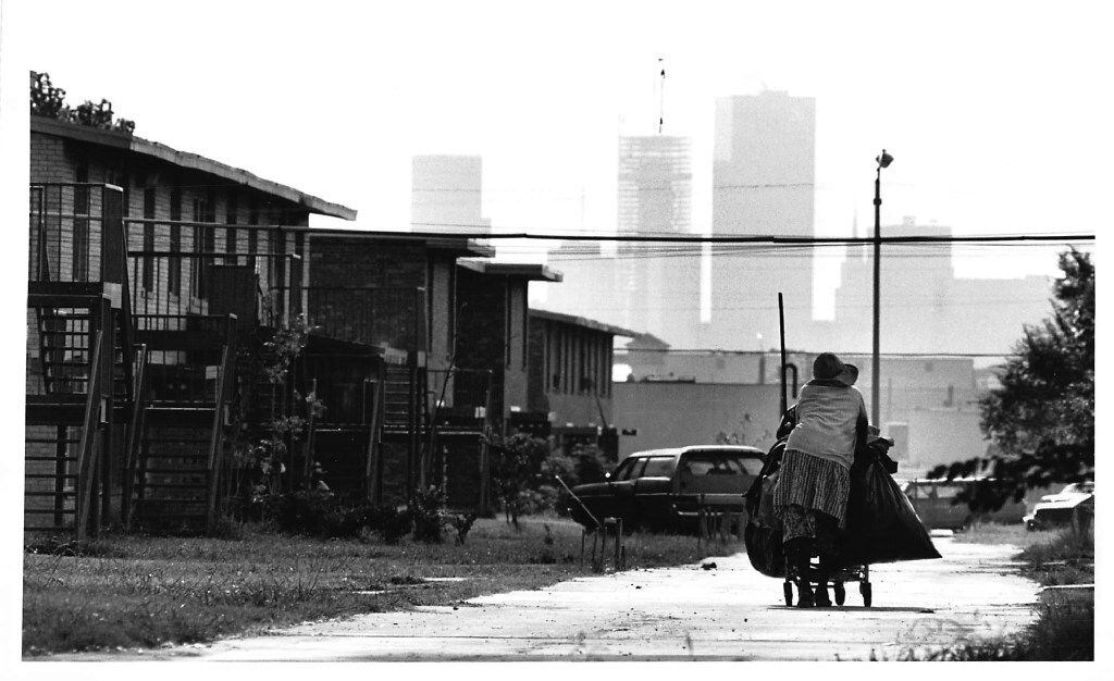 The Dallas skyline looms on the edge of the West Dallas projects, July 1981.