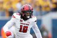 Texas Tech's Tyler Owens (18) in action against West Virginia during an NCAA football game...