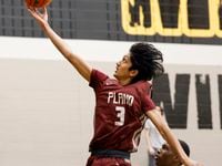 Plano guard Atreya Vaidya (3) attempts a layup during the second half of a non-district game...