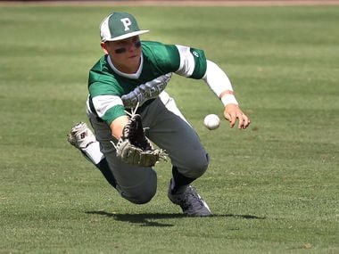 FILE - Prosper's Steele Walker makes a diving grab in center field against Tomball during the UIL State Baseball 5A semifinal in Round Rock on Thursday, June 11, 2015. (Stephen Spillman/Special Contributor)