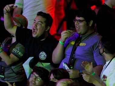 OpTic Texas fans cheer during the team's opening match win over London Royal Ravens, 3-1 to...
