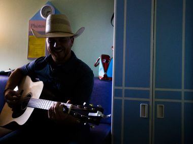 Singer-songwriter Cody Johnson performs his hit song "With You I Am" for Danielle Grey at...