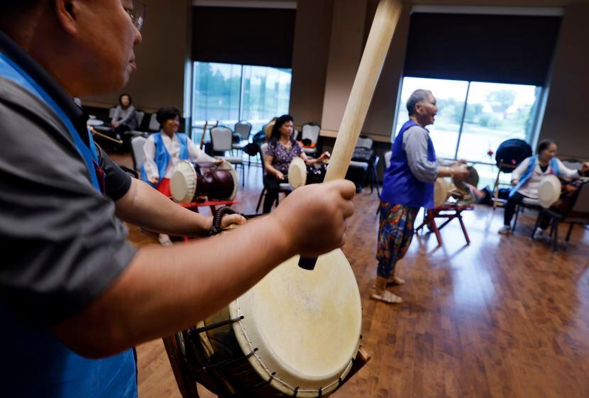 Johnny Yu, a member and teacher in the Arirang Texas Group, practices at the Carrollton...