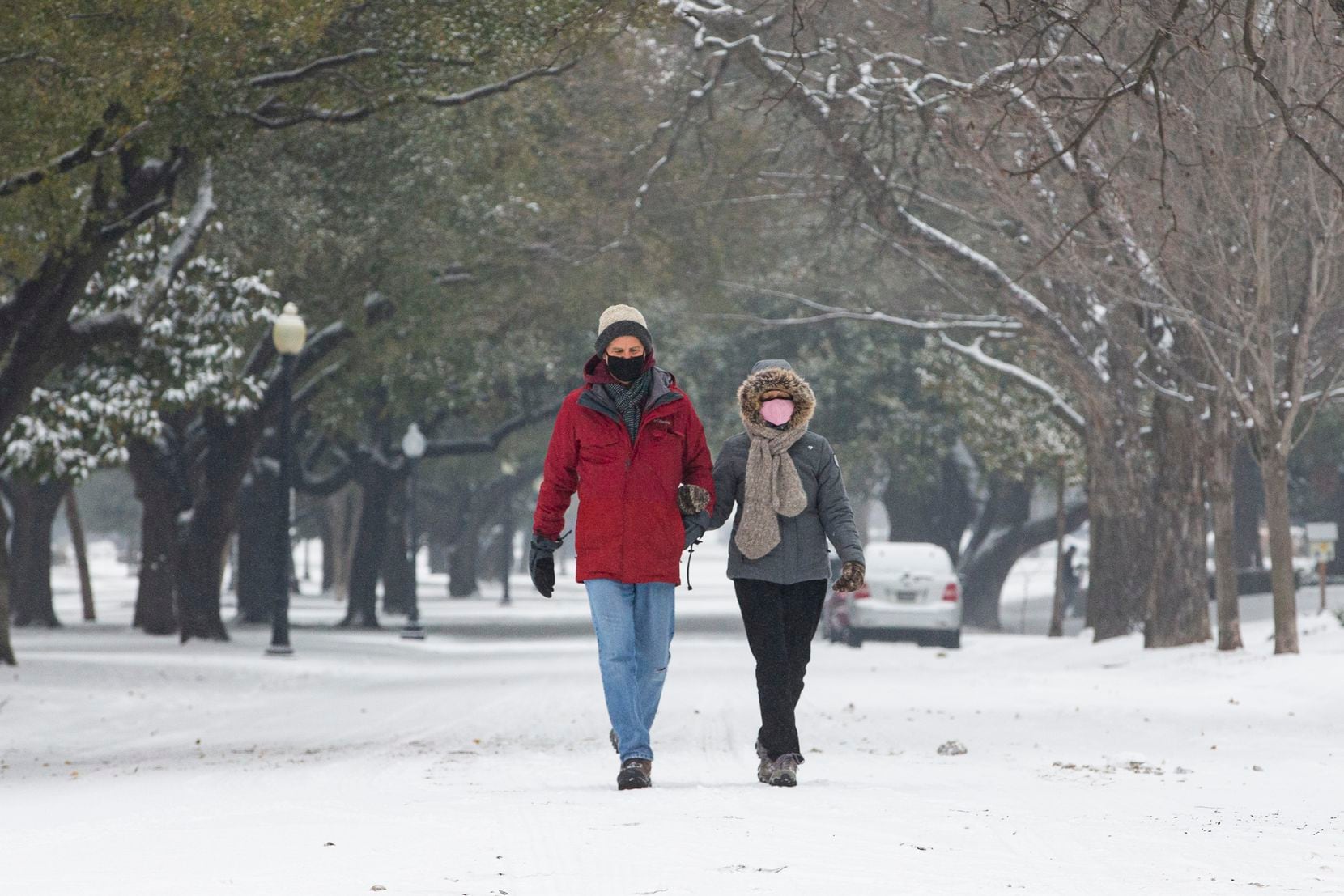 Jack Levison and Priscilla Pope-Levison take a stroll down Swiss Ave in Dallas on Wednesday,...