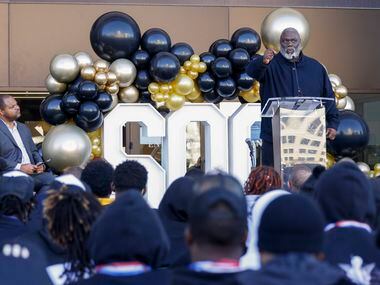 Former Dallas Cowboy Russell Maryland speaks during a ceremony recognizing South Oak Cliff’s...
