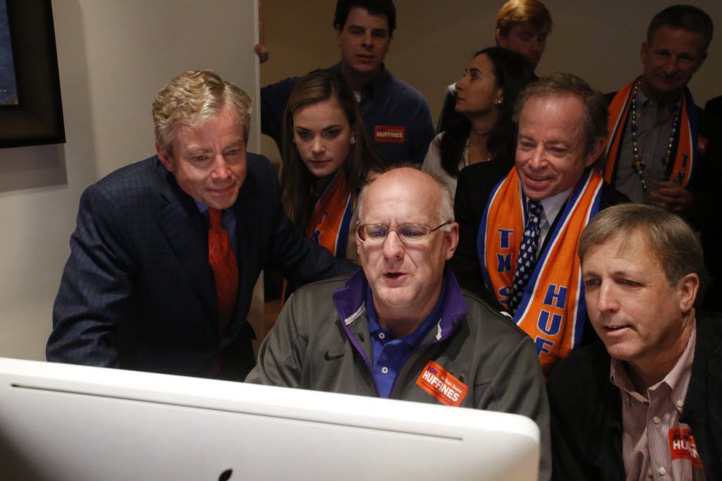 Don Huffines (from left), Deirdre Huffines (daughter), Jim Hairston (treasurer), Phillip Huffines and Bragg Smith look at results in Don Huffines' race against Sen. John Carona for the state Senate in March 2014.