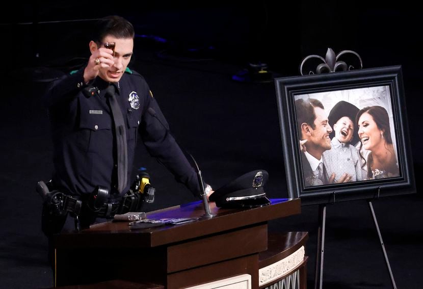 Dallas police officer Colton Upchurch raised a shot of whiskey at Penton’s funeral. They...