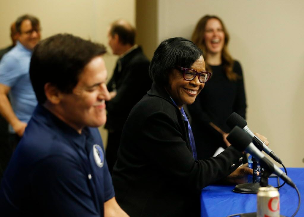 Dallas Mavericks interim CEO Cynthia Marshall answers questions from the media as Dallas Mavericks owner Mark Cuban listens during a press conference at American Airlines Center in Dallas on Monday, February 26, 2018. Marshall has been hired by the Mavericks to help clean up after the recent sexual assault scandal in the front office. (Vernon Bryant/The Dallas Morning News)